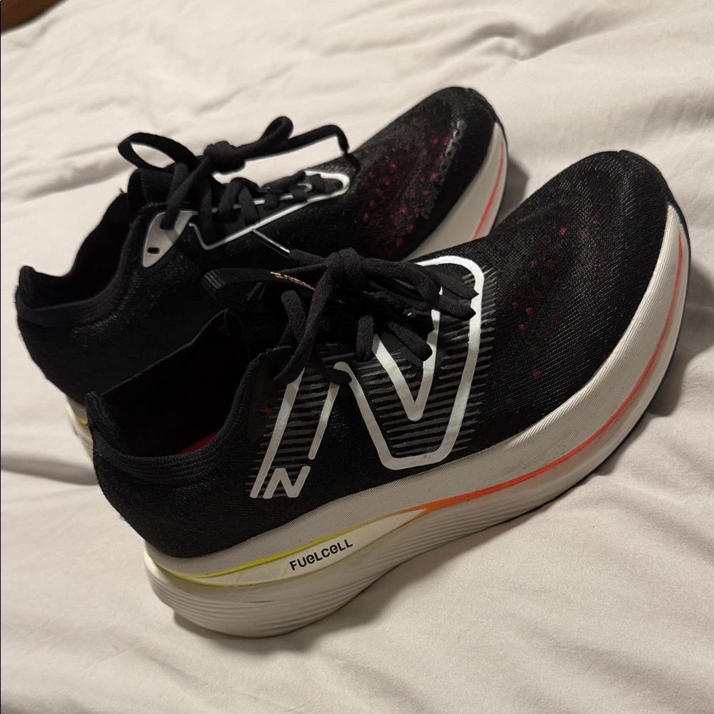 New Balance Women's Black and White Athletic Shoes